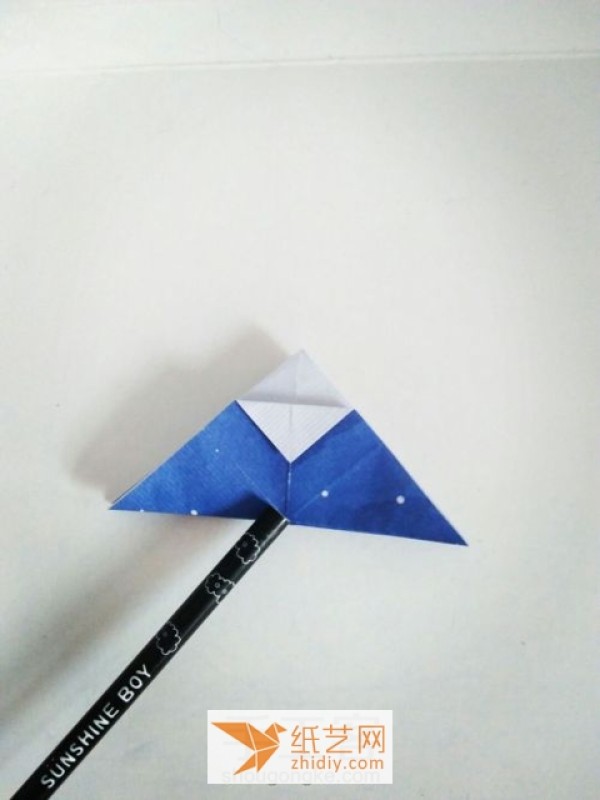 Cute origami volcano making tutorial illustration