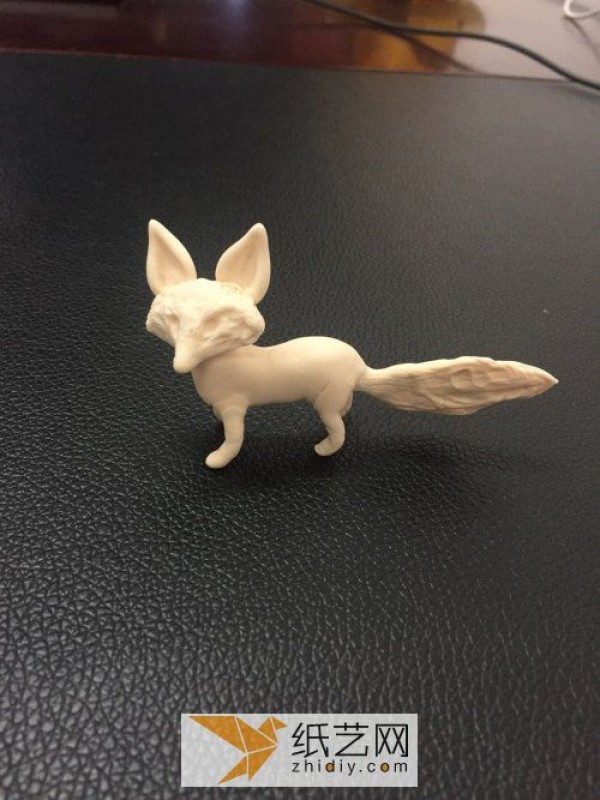 Cute little fox made of ultra-light clay