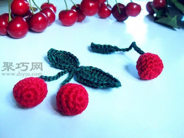 Tutorial on knitting fruits with wool. Knit cherries by hand with wool.