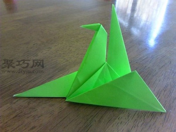 Illustration of how to fold a paper crane. Fold a green paper crane that symbolizes peace.