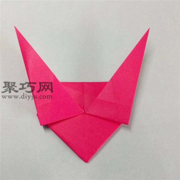 Illustration of how to fold a heart with wings. How to fold a three-dimensional origami heart with angel wings.