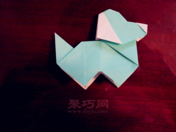 How to fold a super cute puppy. Step-by-step illustration of 3D puppy origami.