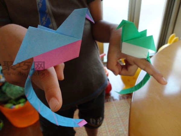 Origami long-tailed bird tutorial: a bird you can put on your hand