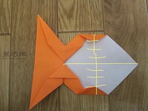 How to fold cute origami fish out of paper