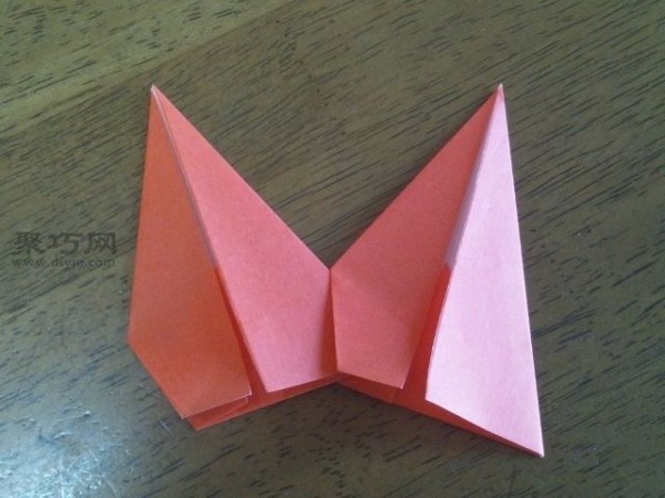 Teach you how to make a kindergarten small red flower medallion with origami