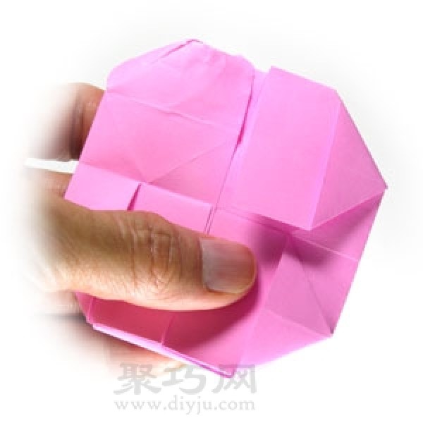 Illustration of steps for making origami pig head