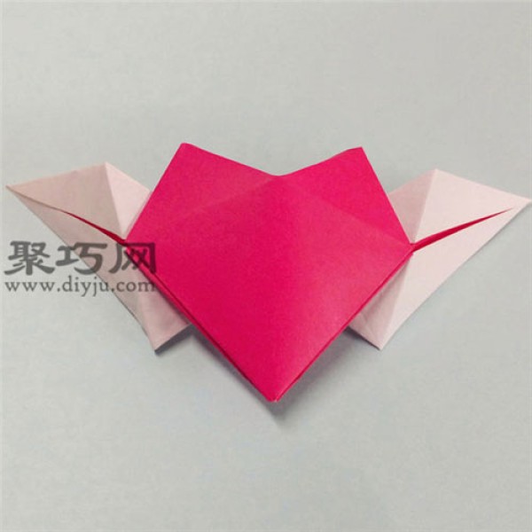 Illustration of how to fold a heart with wings. How to fold a three-dimensional origami heart with angel wings.