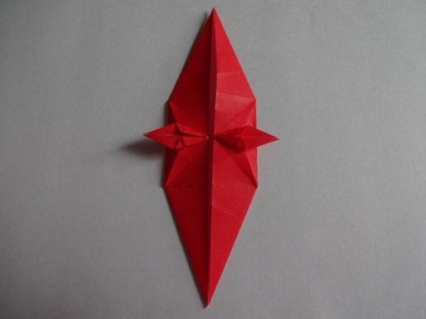 Tutorial on making Christmas origami eight-pointed star How to make small Christmas decorations through origami