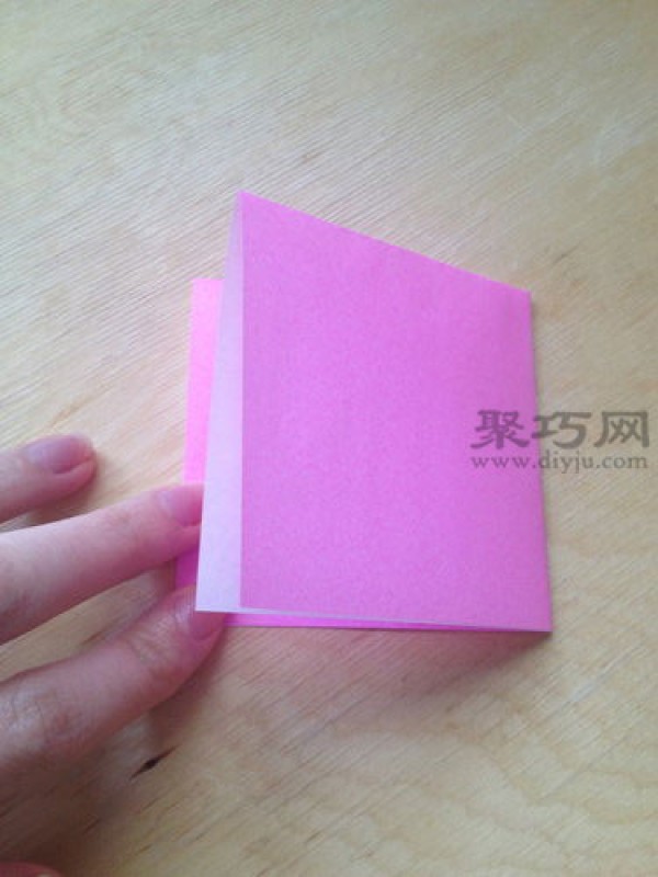 Hand-folded peach from square paper. Illustrated tutorial on origami three-dimensional peach.