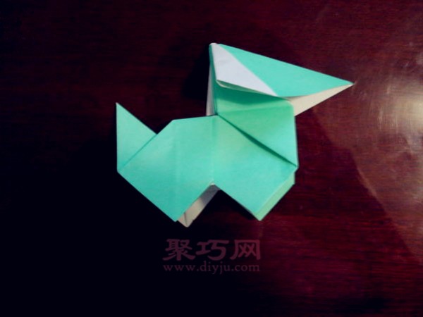 How to fold a super cute puppy. Step-by-step illustration of 3D puppy origami.