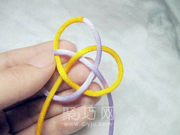 How to braid a double-money knot. Illustrated tutorial on the Chinese knot mainline double-money knot.