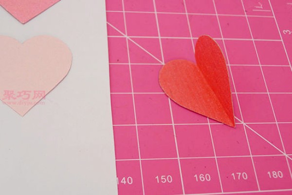 DIY handmade heart-shaped photo frame tutorial using colorful cardboard