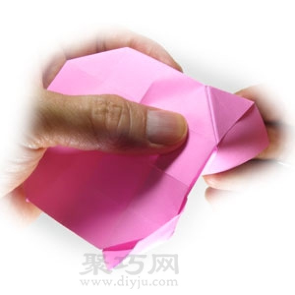 Illustration of steps for making origami pig head