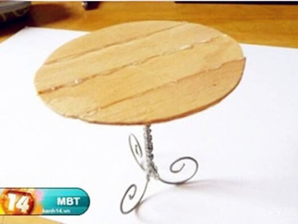 Illustration of how to make a simple coffee table and chair combination by hand using ice cream sticks and wire