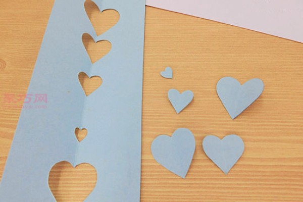 DIY handmade heart-shaped photo frame tutorial using colorful cardboard