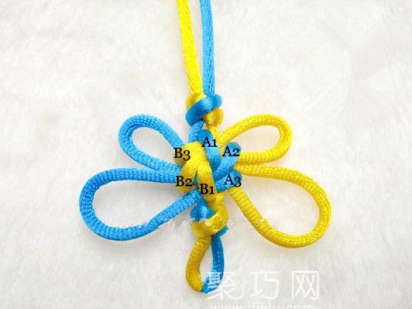 Steps of knitting Chinese knots. Illustrated tutorial on how to knit Baojie Erbao 3-tackle knot.