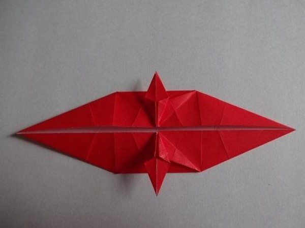 Tutorial on making Christmas origami eight-pointed star How to make small Christmas decorations through origami