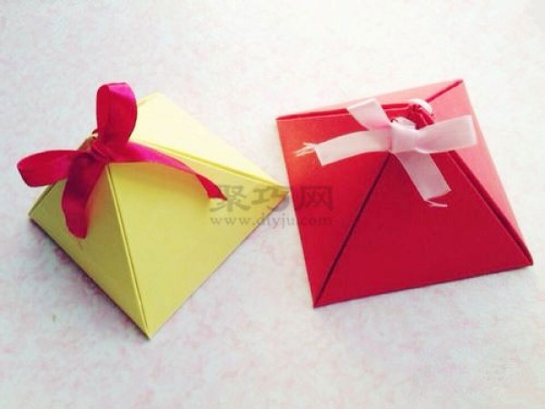 The simplest handmade origami packaging box. Illustration of making a triangular gift box.