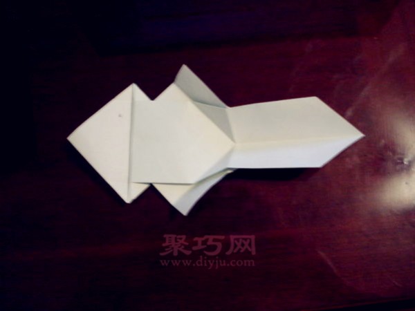 How to fold a super cute puppy. Step-by-step illustration of 3D puppy origami.