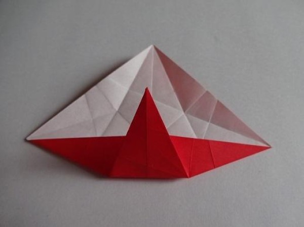 Tutorial on making Christmas origami eight-pointed star How to make small Christmas decorations through origami