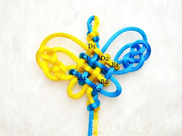 Illustrated tutorial on how to tie Chinese knot with long butterfly and double money