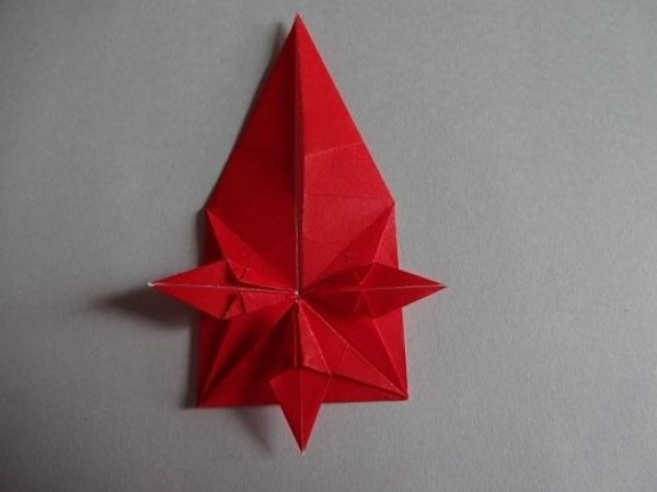 Tutorial on making Christmas origami eight-pointed star How to make small Christmas decorations through origami