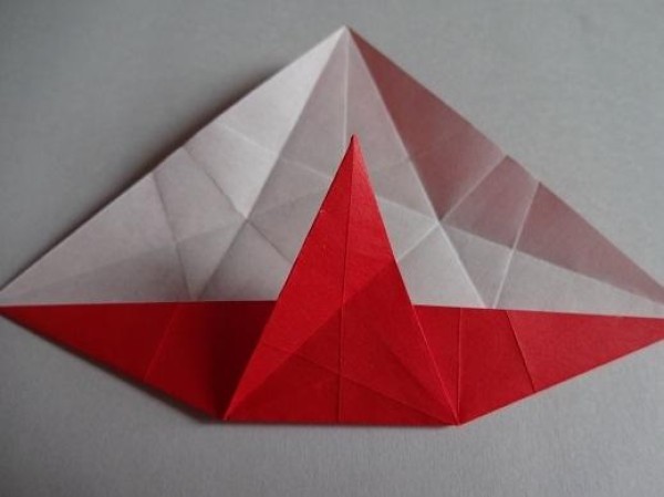 Tutorial on making Christmas origami eight-pointed star How to make small Christmas decorations through origami