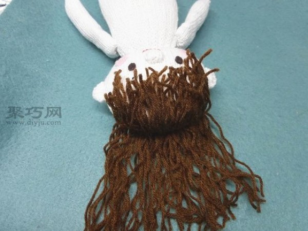 Illustrations of making handmade puppets Small handmade production of woolen cartoon puppets