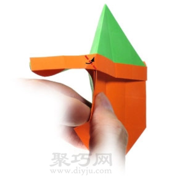 Illustration of how to fold the face of the origami elf