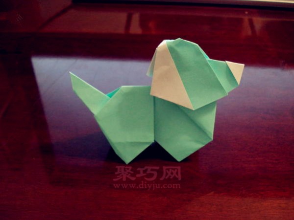 How to fold a super cute puppy. Step-by-step illustration of 3D puppy origami.