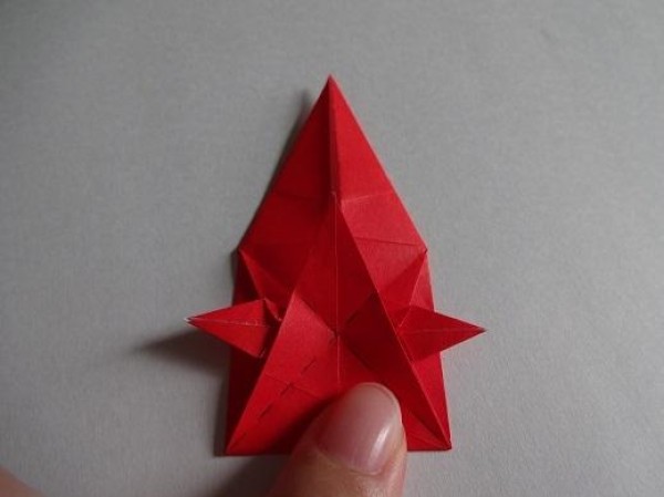 Tutorial on making Christmas origami eight-pointed star How to make small Christmas decorations through origami