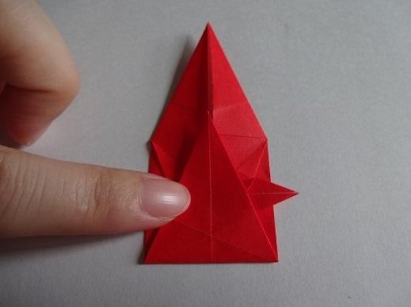 Tutorial on making Christmas origami eight-pointed star How to make small Christmas decorations through origami