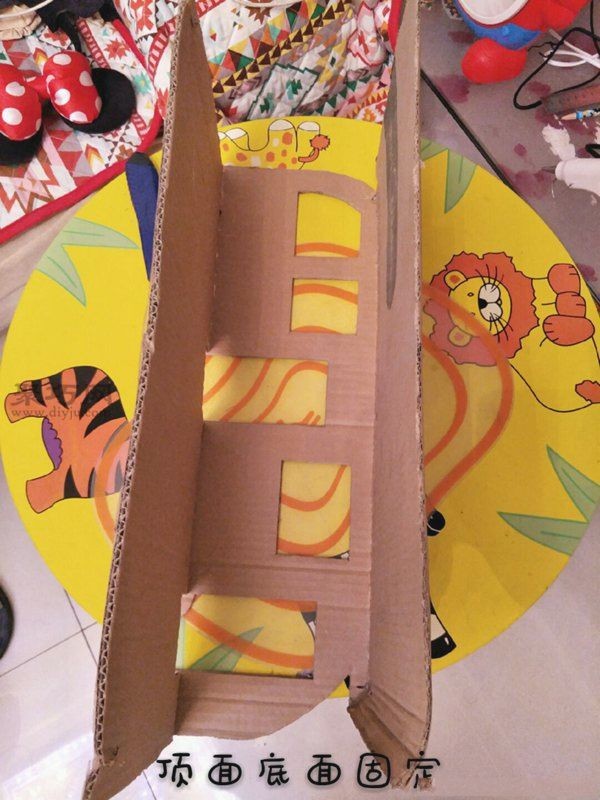 Handmade tutorial for children to DIY a toy bus using waste cardboard boxes