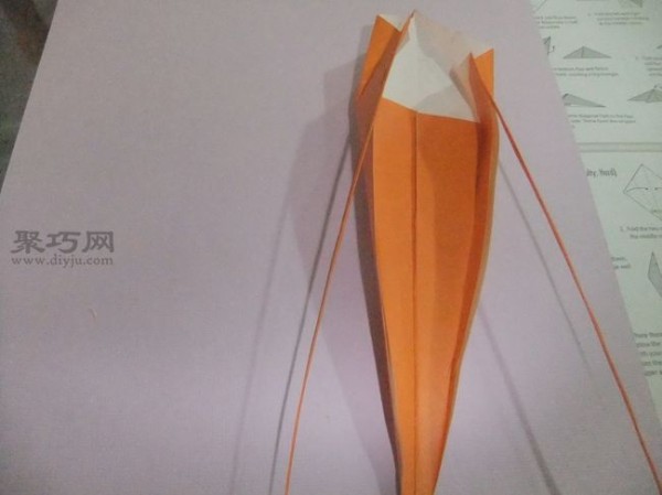 Tutorial on how to make a simple origami shrimp using a piece of paper