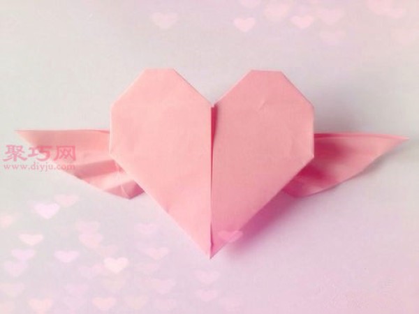 Illustration of how to fold a heart with wings. Teach you how to fold an angel heart.