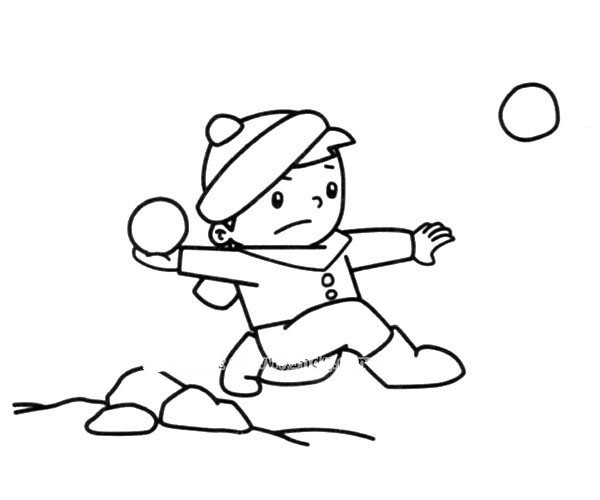 Little boy having snowball fight