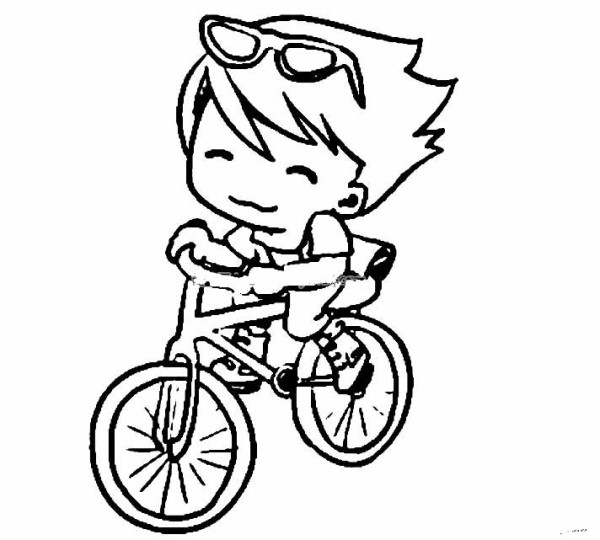 little boy riding a bicycle