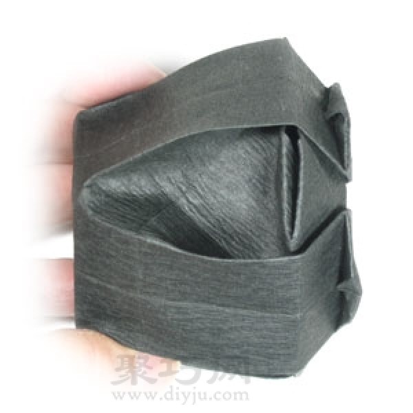 Steps to fold handmade origami Halloween cauldron