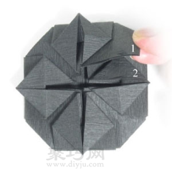 Steps to fold handmade origami Halloween cauldron