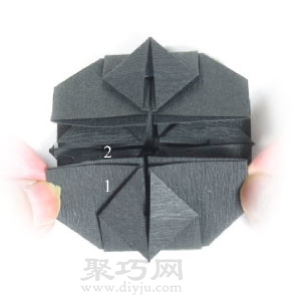 Steps to fold handmade origami Halloween cauldron