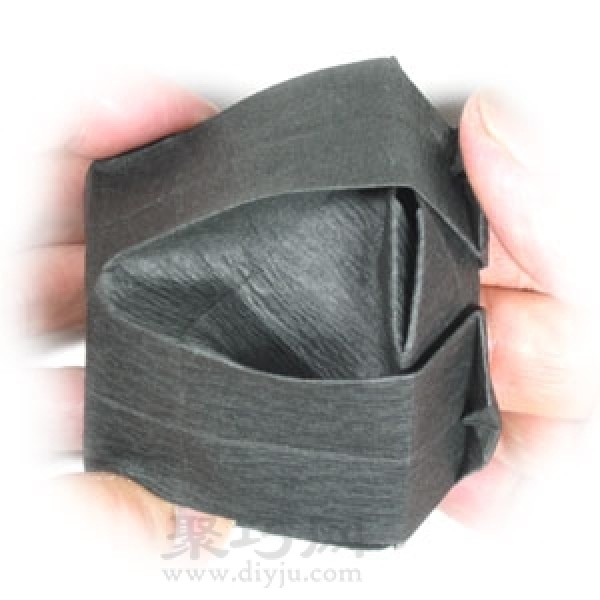 Steps to fold handmade origami Halloween cauldron