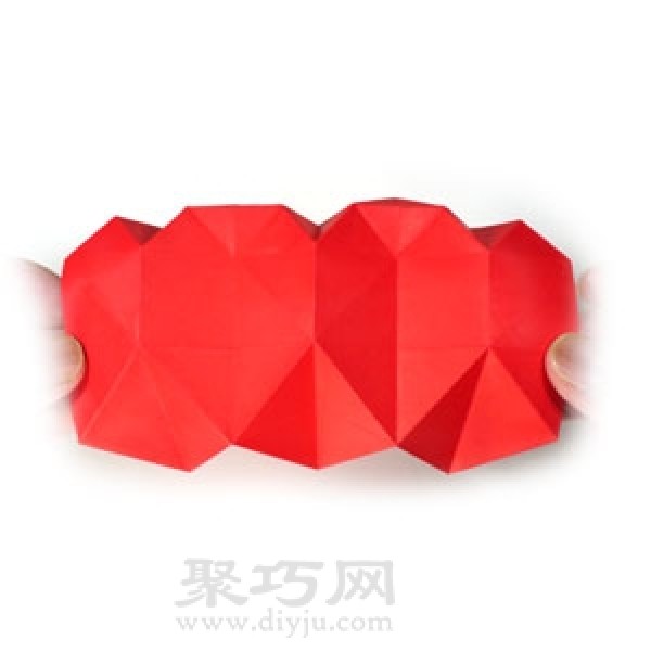 How to fold a heart-shaped spring. Use a piece of paper to fold a heart-shaped spring.