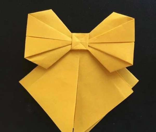 Illustrated tutorial on handmade origami bows, folding bows with paper