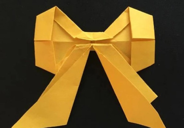 Illustrated tutorial on handmade origami bows, folding bows with paper