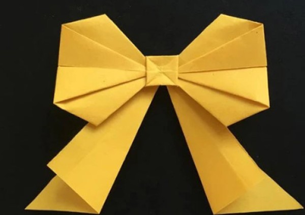 Illustrated tutorial on handmade origami bows, folding bows with paper