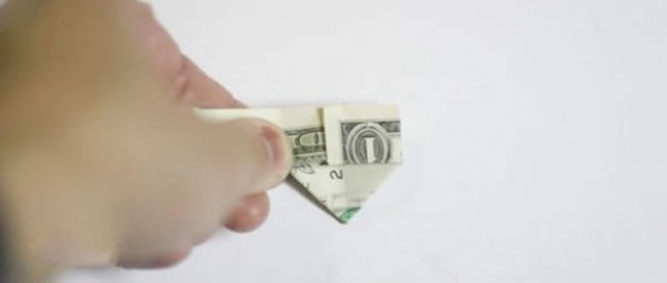 How to fold one dollar origami with two hearts. Illustrated tutorial on folding two hearts with money.