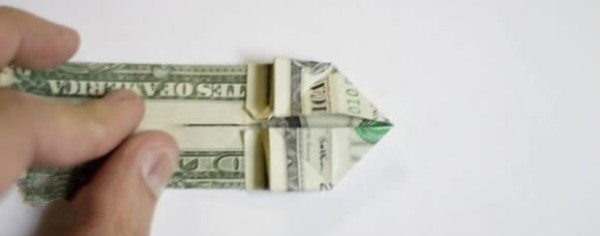 How to fold one dollar origami with two hearts. Illustrated tutorial on folding two hearts with money.