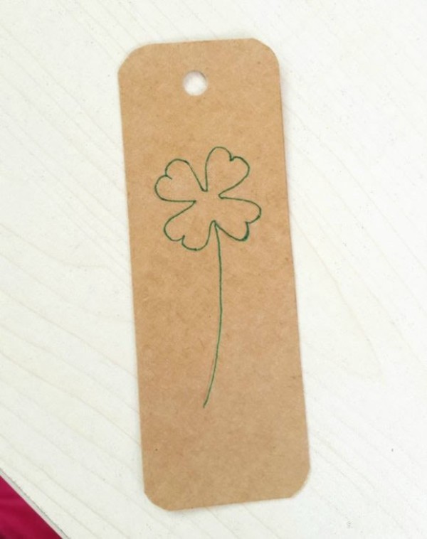 Renovation of old items: handmade simple bookmarks from waste paper boxes