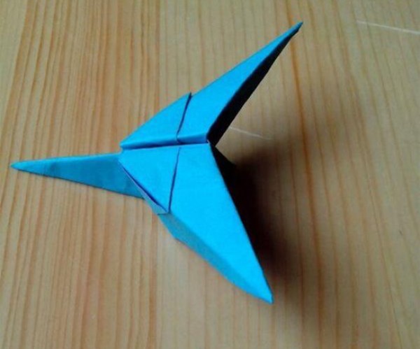 Illustration of steps for folding swallow paper airplane