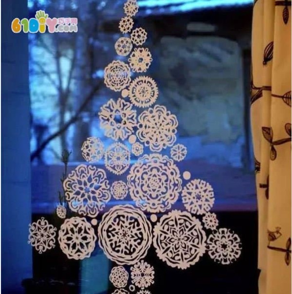 Beautiful Christmas window decorations Paper cut snowflake Christmas tree